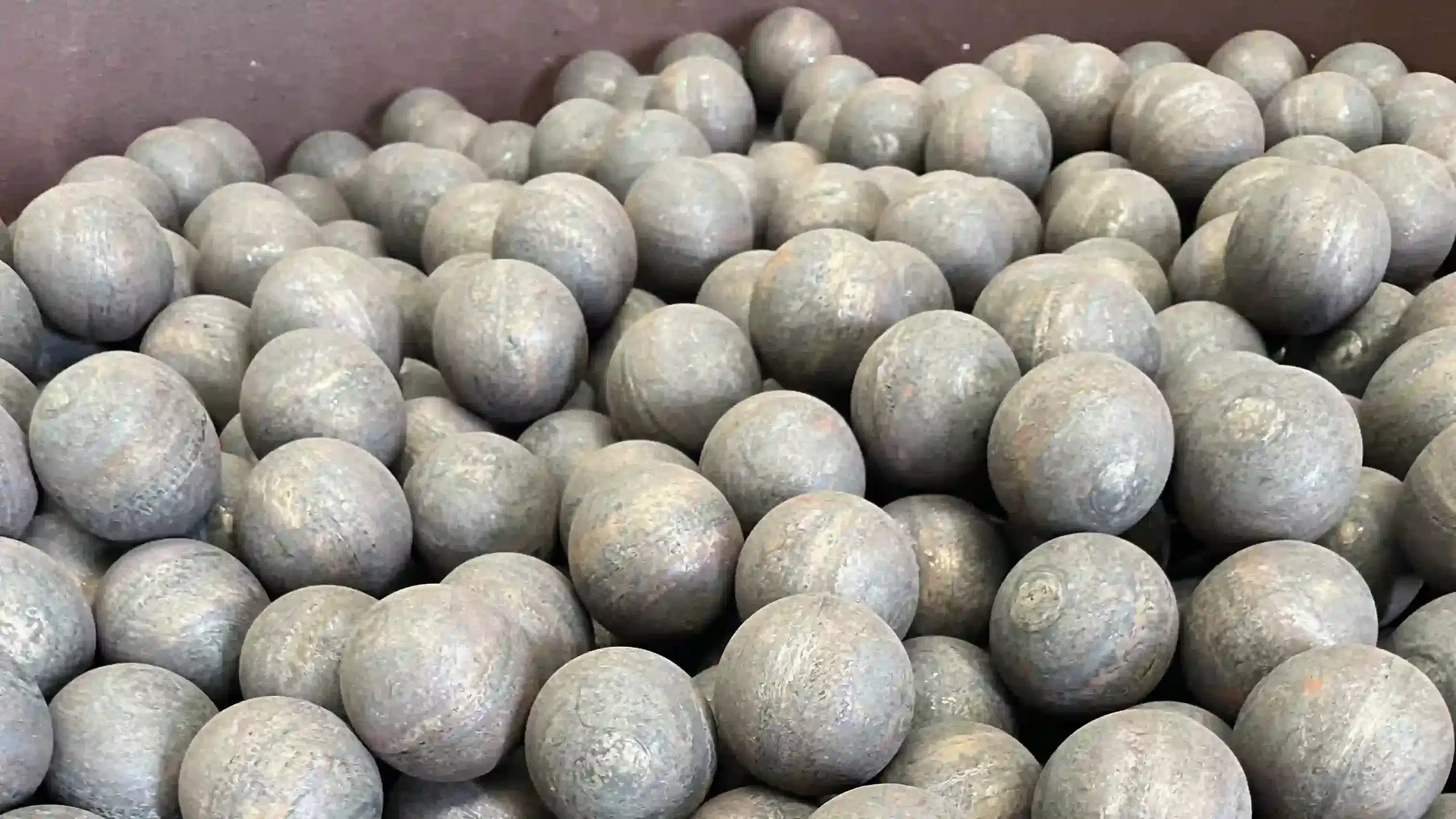 Forged grinding balls for mining and mineral processing