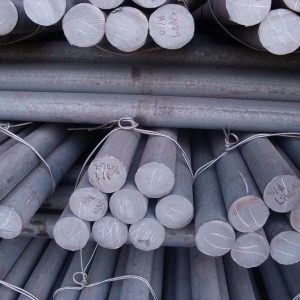 Bundles of grinding steel rods stacked together, commonly used in rod mills for ore processing, cement manufacturing, and mineral grinding.