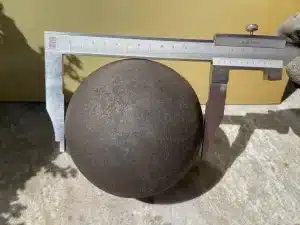 Forged steel grinding ball for industrial use.
