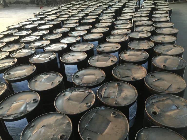 Iron barrel packaging for grinding media balls, used for industrial milling applications such as mining, cement production, and power plants.